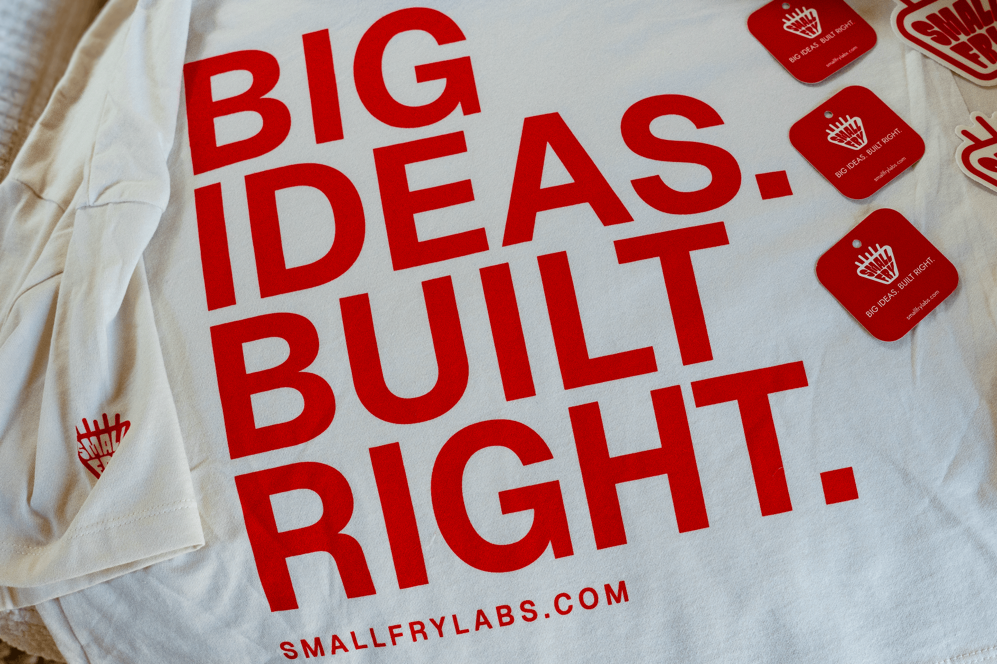 Big Ideas Built Right print detail beside die-cut hangtags
