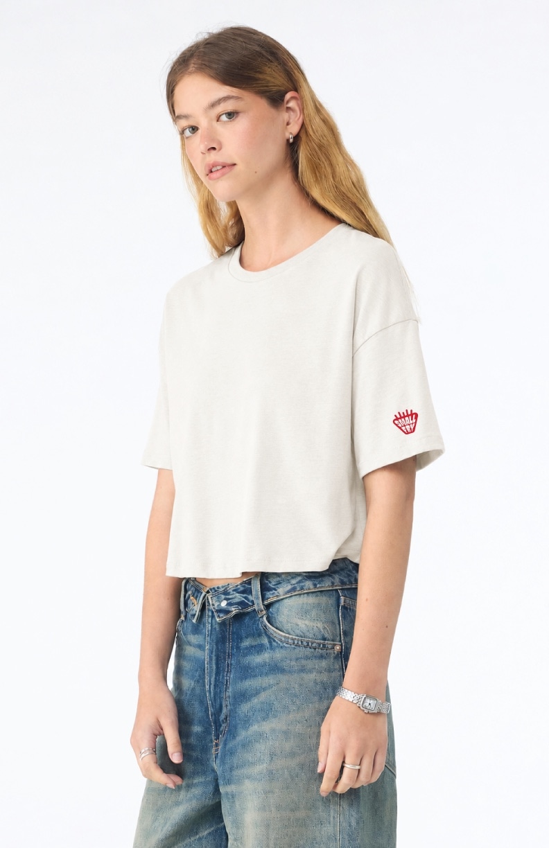 Small Fry Labs cropped shirt sleeve mark